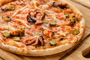 Что итальянцы добавляют в пиццу? фото