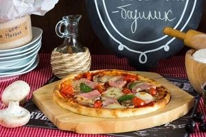 Міні піца з шинкою та руколою фото