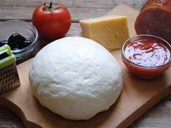 Рецепты теста для пиццы: идеальное сочетание ингредиентов для непревзойденного вкуса - фото 1